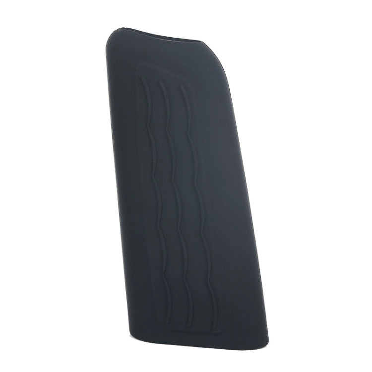 Black silicone handbrake handle cover sleeve with wavy embossed grip texture.