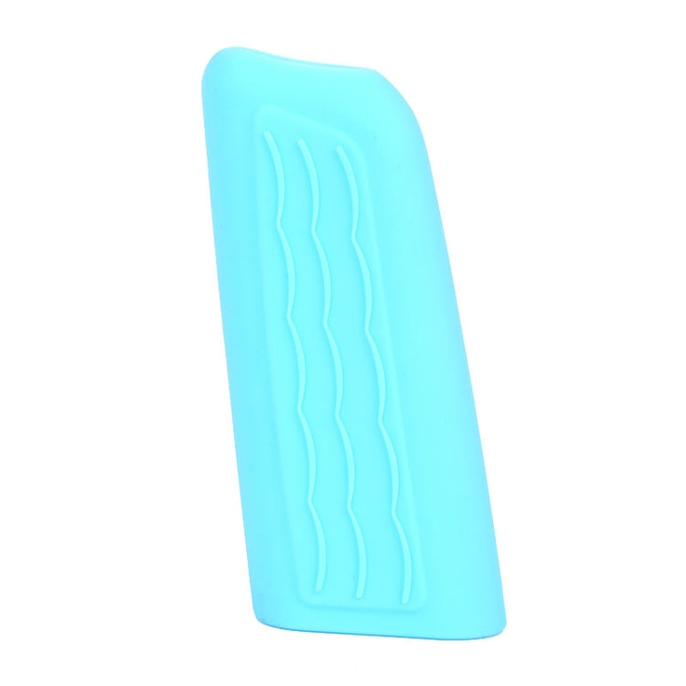 Light blue silicone handbrake handle cover sleeve with wavy embossed grip texture.