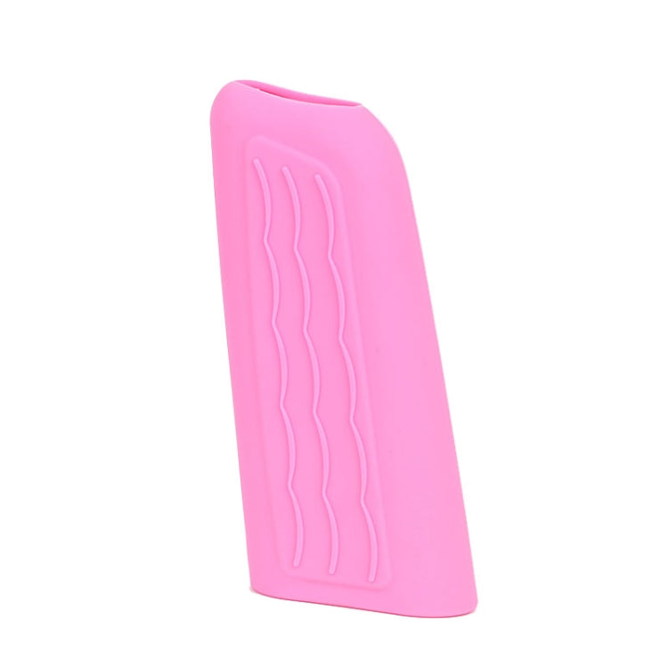 Pink silicone handbrake handle cover sleeve with wavy embossed grip texture.