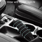 Black silicone handbrake handle cover installed on a car center console handbrake.