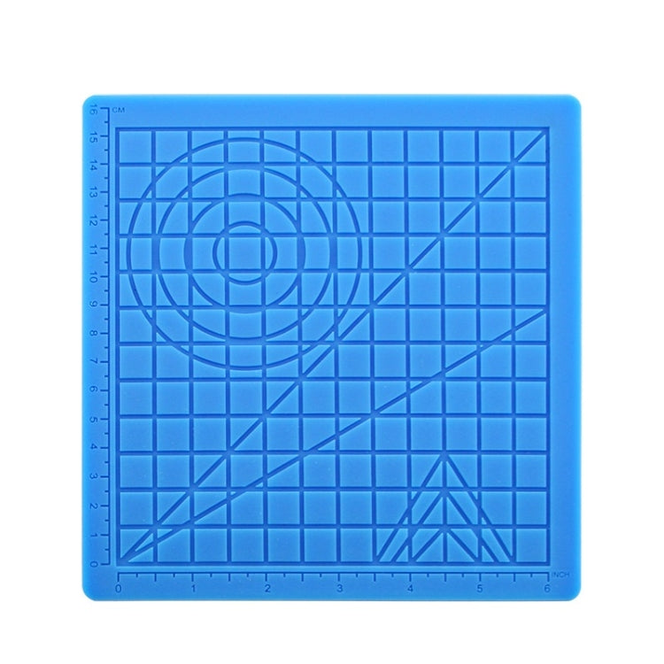 Blue silicone 3D drawing template mat with grid lines, circular guide, and ruler marks