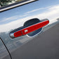 Red carbon-fiber exterior door handle sticker installed on car door handle cover