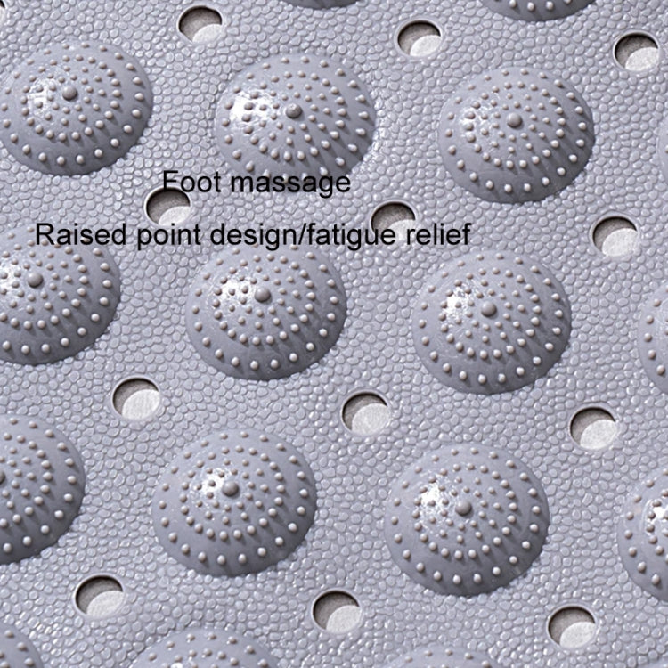 Gray PVC bathroom mat surface with raised round massage nodes and drainage holes
