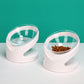 White inclined pet food bowls with clear dishes on a single base