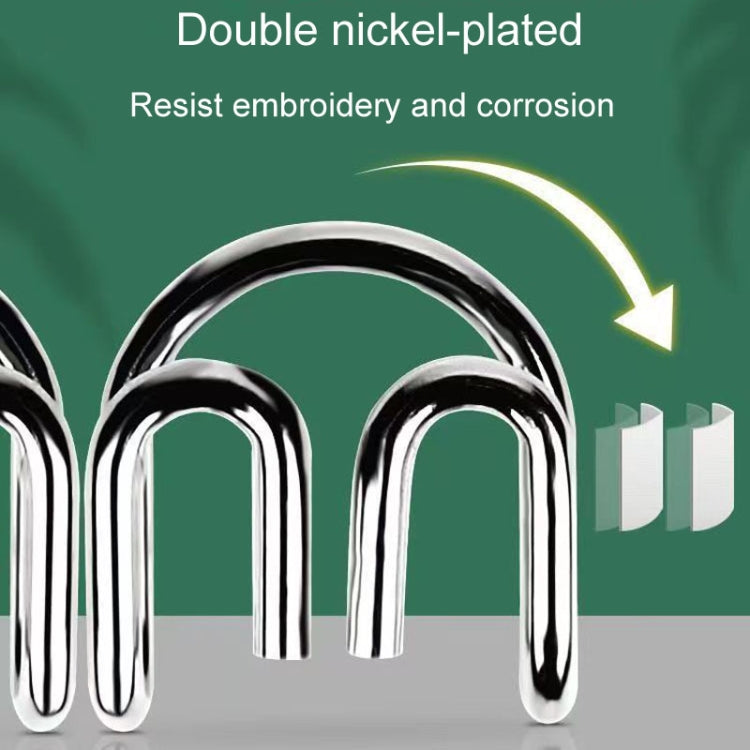 Close-up of arched U-shaped metal links connected with rings