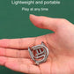 Small shiny metal nine-link puzzle piece held in a hand