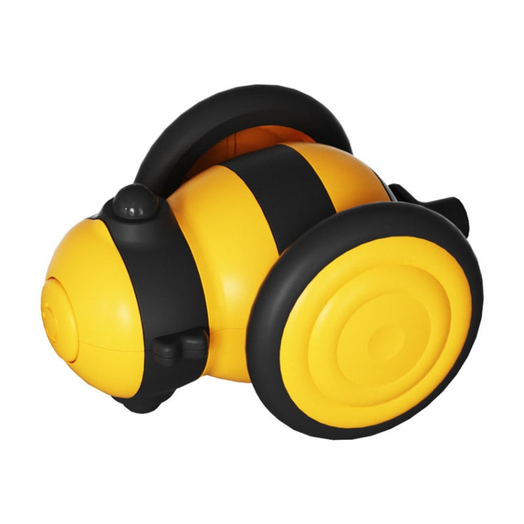 Yellow and black motorized cat teasing toy with oversized wheel-like sides