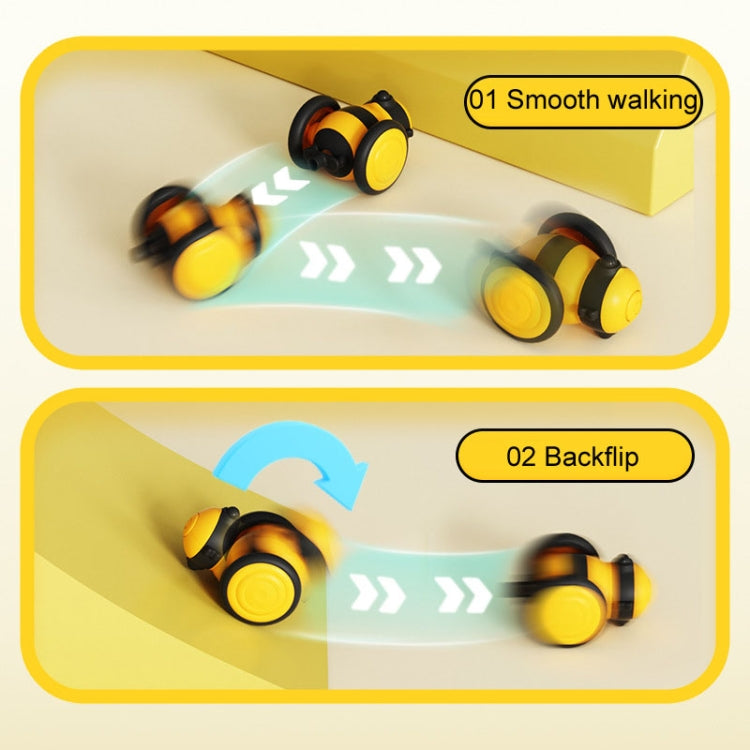Yellow and black motorized cat toy in two motion poses with arrow graphics