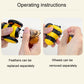 Yellow and black motorized cat toy showing removable feathers and wheels