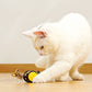 White cat-shaped motorized pet toy with bee design and rolling wheels