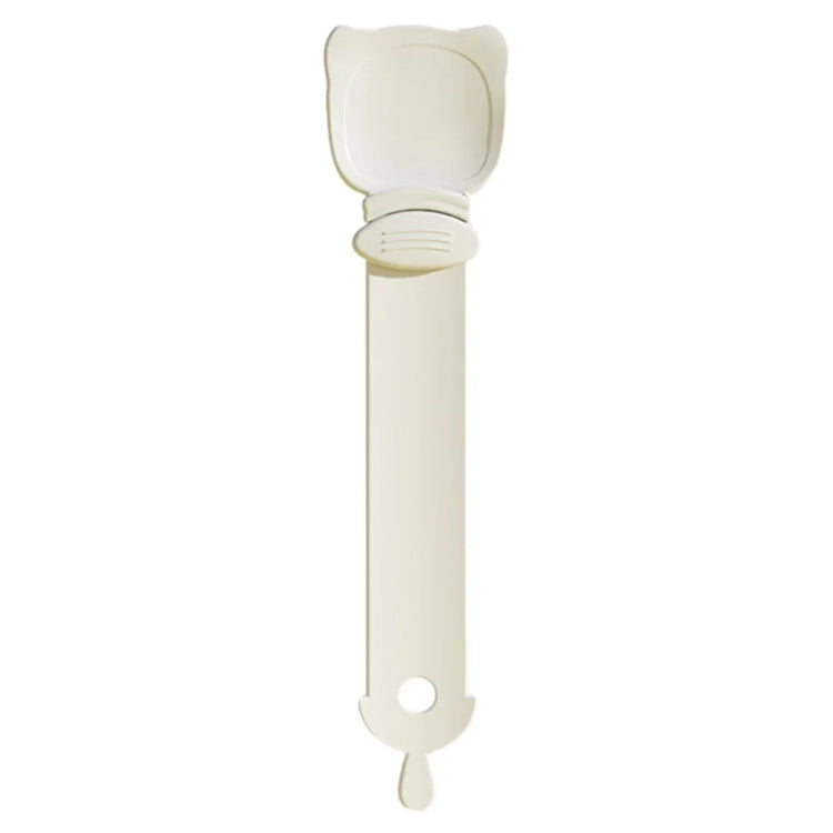 Cat feeding spoon with squeeze applicator, cream handle and hinged scoop head.