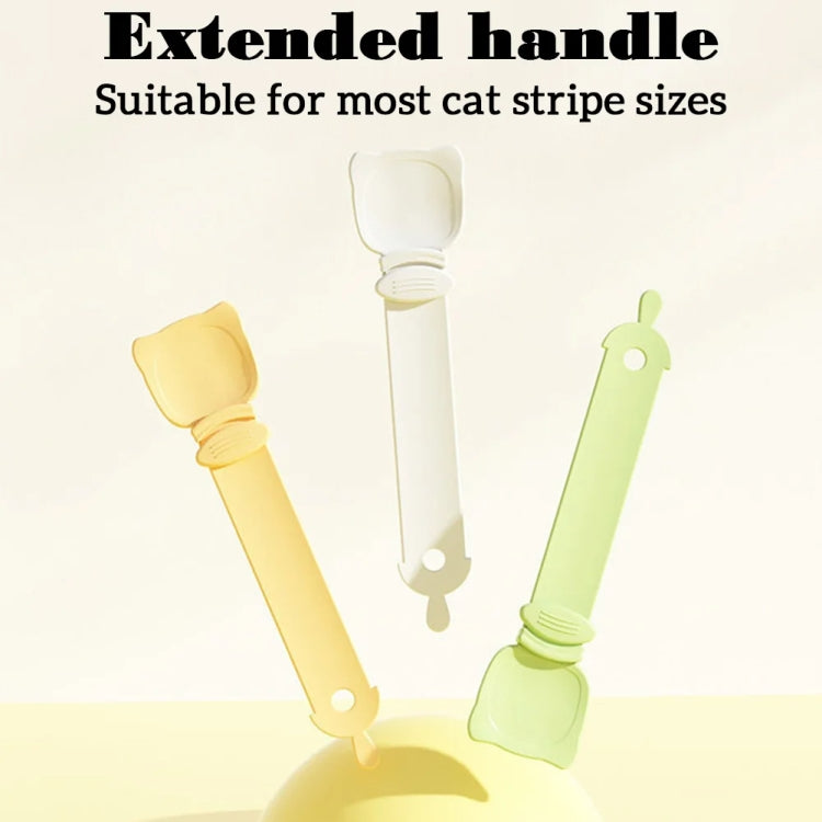 Cat feeding spoon with extended handle in cream, yellow, and green versions.