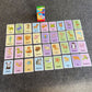 Animal flash cards laid out, colorful cards with animal names, 36-piece set