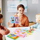 Children's word learning flashcards, animal picture cards held up for matching