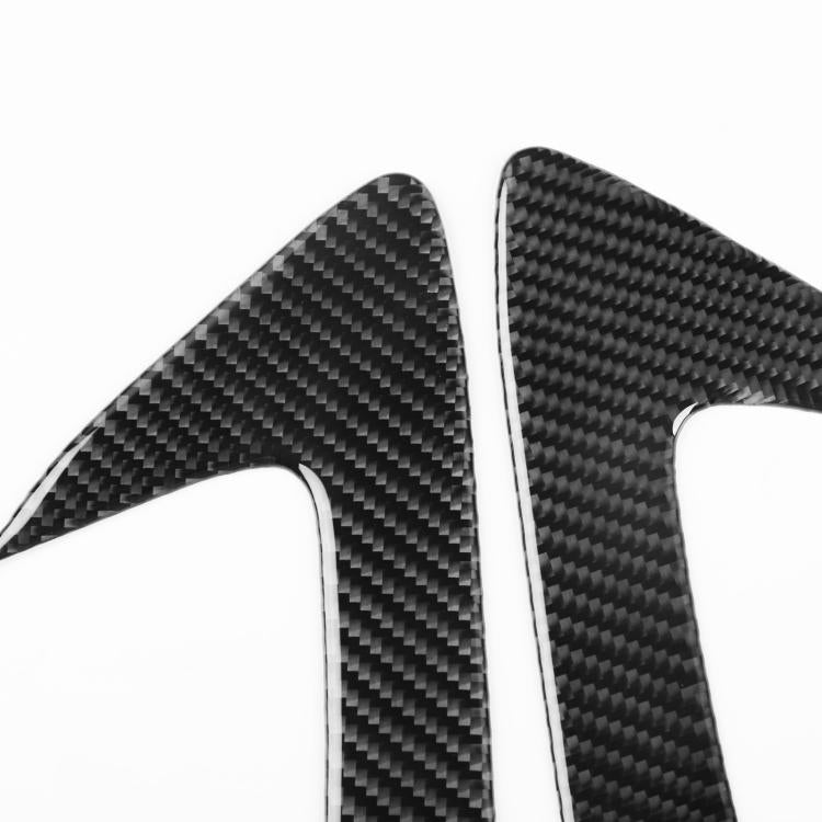 Black carbon-fiber headlight eyebrow sticker, curved edge texture close-up