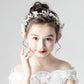 White pearl and flower wreath hair band on a model's hair, off-shoulder dress