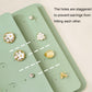 Inside view of green jewelry bag showing earring holes and separate storage sections