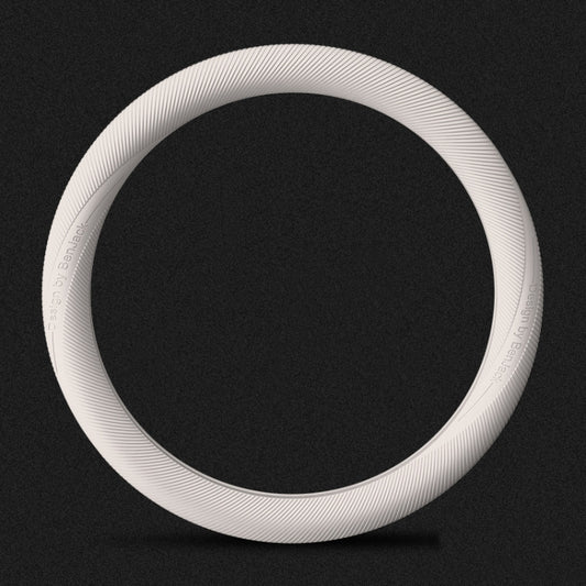 Beige silicone steering wheel cover with ribbed anti-slip grip texture.