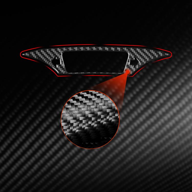 Black carbon-fiber dashboard sticker set with red trim outline and texture closeup