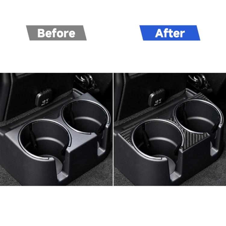 Rear cup holder stickers with carbon-fiber look applied around two cup holders