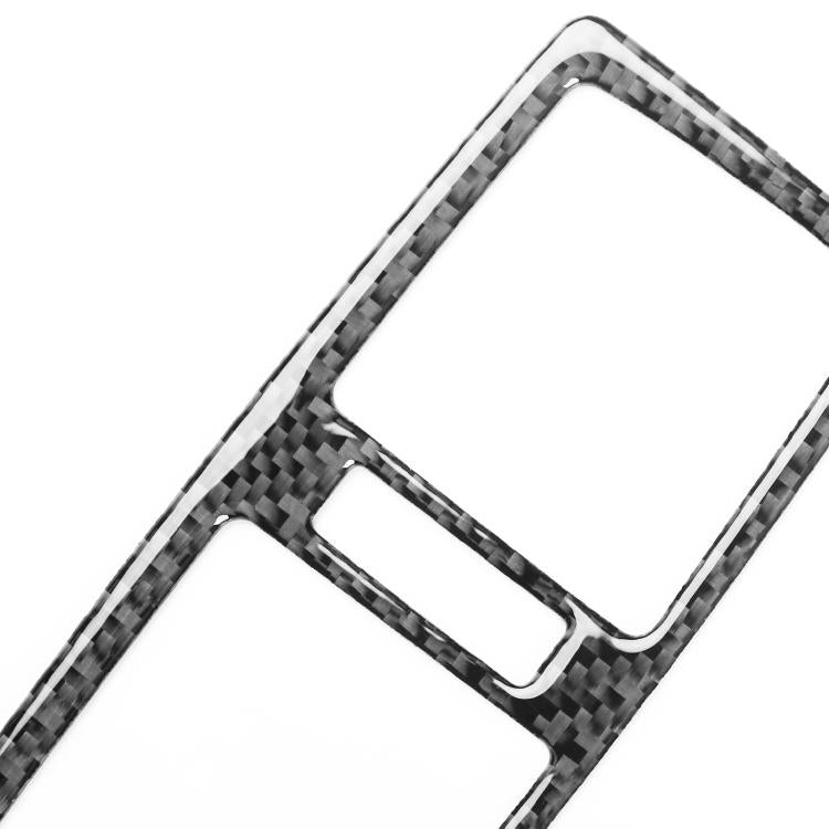 Rear air outlet sticker trim close-up, black carbon-fiber corner with center slot