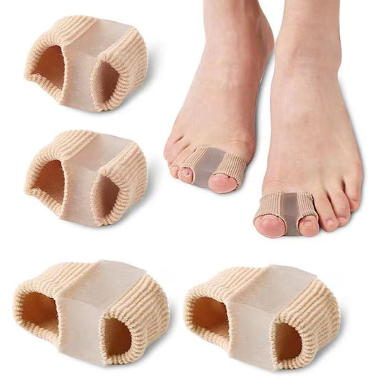 Beige double-hole toe separator orthosis shown from multiple angles