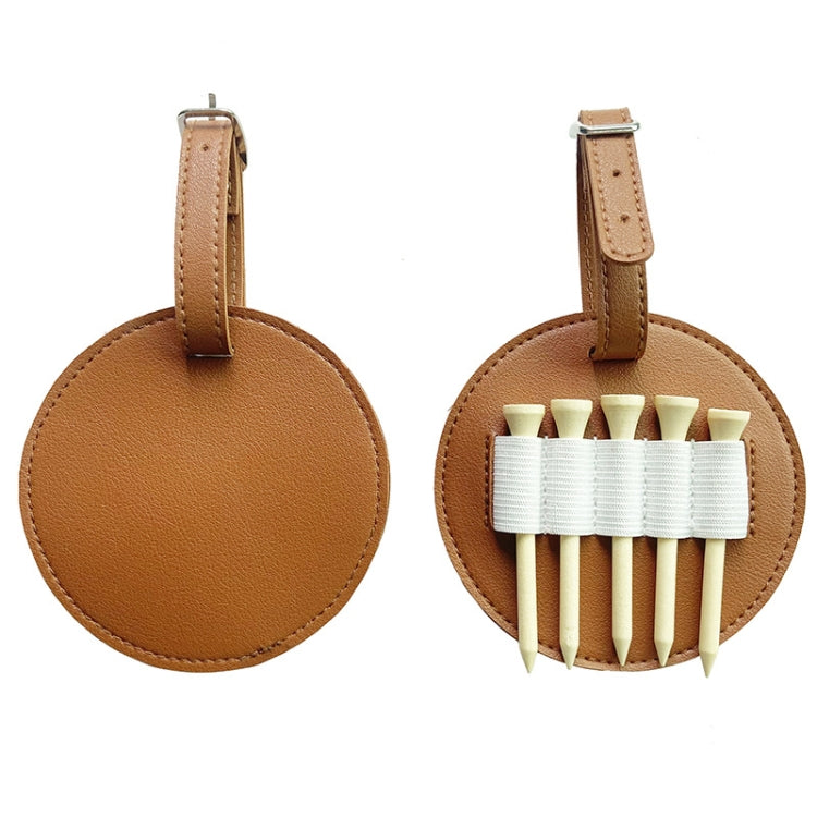 Pair of brown leather oval spike insert pouches—one empty, one with elastic slots and spikes.