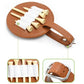 Brown leather spike insert pouch with buckle strap and elastic band holding nail inserts.