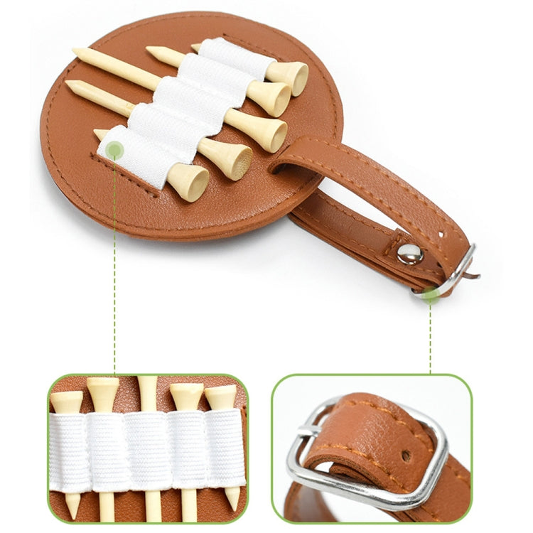 Brown leather spike insert pouch with buckle strap and elastic band holding nail inserts.