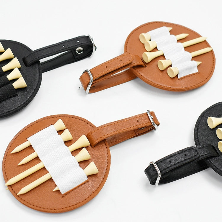 Set of leather spike insert pouches in brown and black, each with elastic slots and buckle straps.