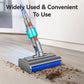 Wet vacuum mopping head with blue roller brush and gray base on dusty floor.