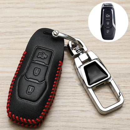 Black leather-style car key cover with red stitching, metal keyring and chrome holder