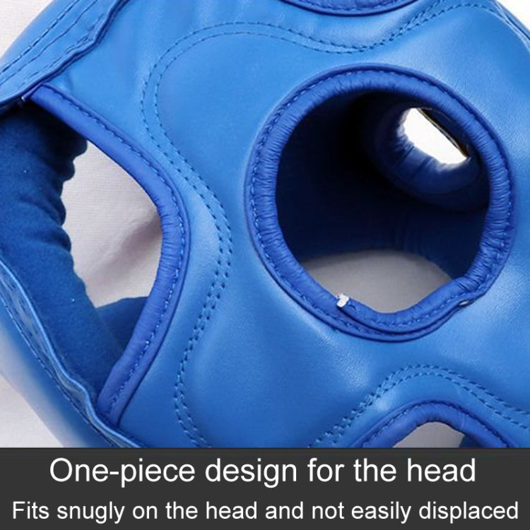 Blue boxing sparring helmet close-up with face opening and padded eye area