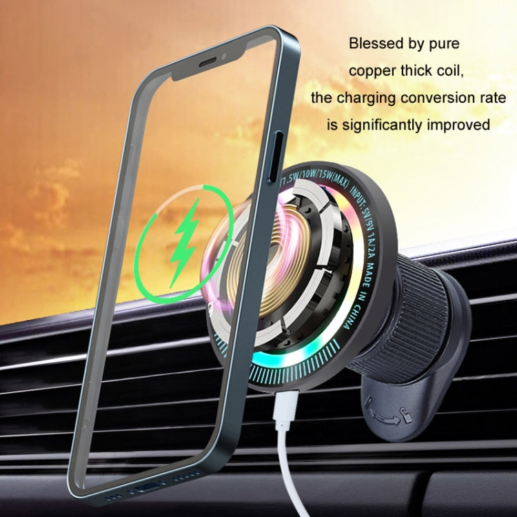 Dark gray wireless car phone charger with phone attached and illuminated charging ring