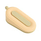 Yellow-cream silicone donut door stopper with oval slot and small peg