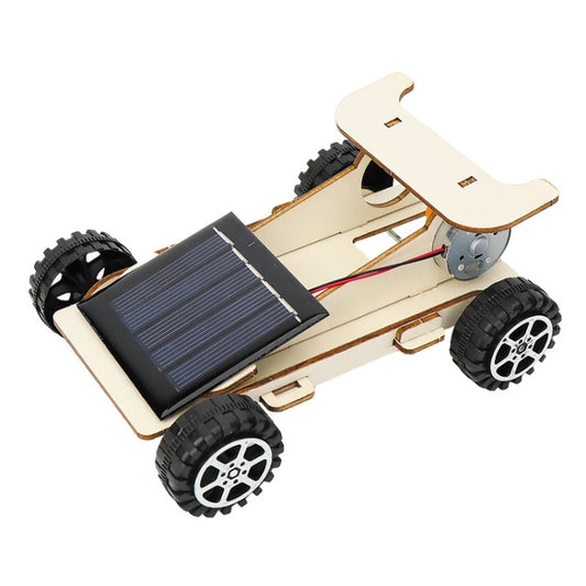 Solar powered DIY wooden car kit with solar panel, wires, and four rubber wheels