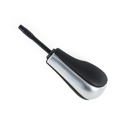 Gear lever head with black grip and silver oval insert