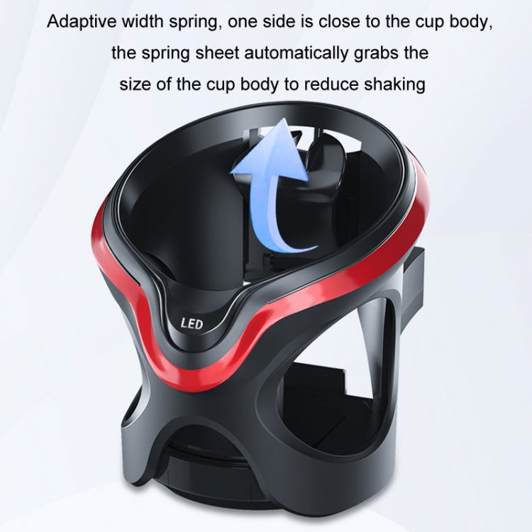 Car cup holder with adaptive spring grip inside the top opening