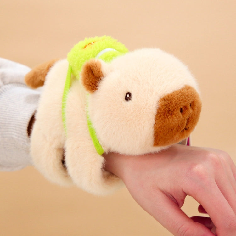 Beige plush dolphin snap-ring bracelet with green accent and pull ring