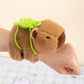 Brown plush turtle snap-ring bracelet with green backpack and pull ring