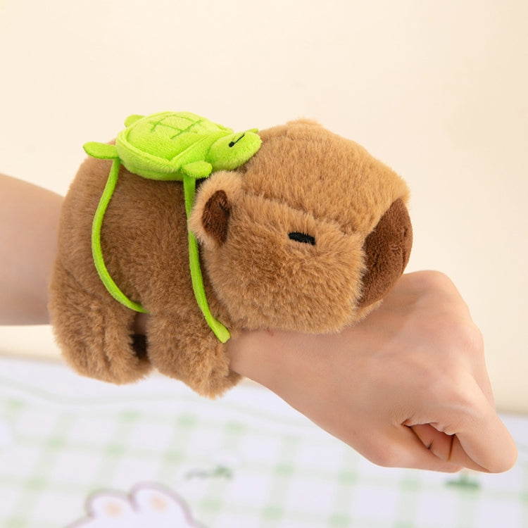 Brown plush turtle snap-ring bracelet with green backpack and pull ring