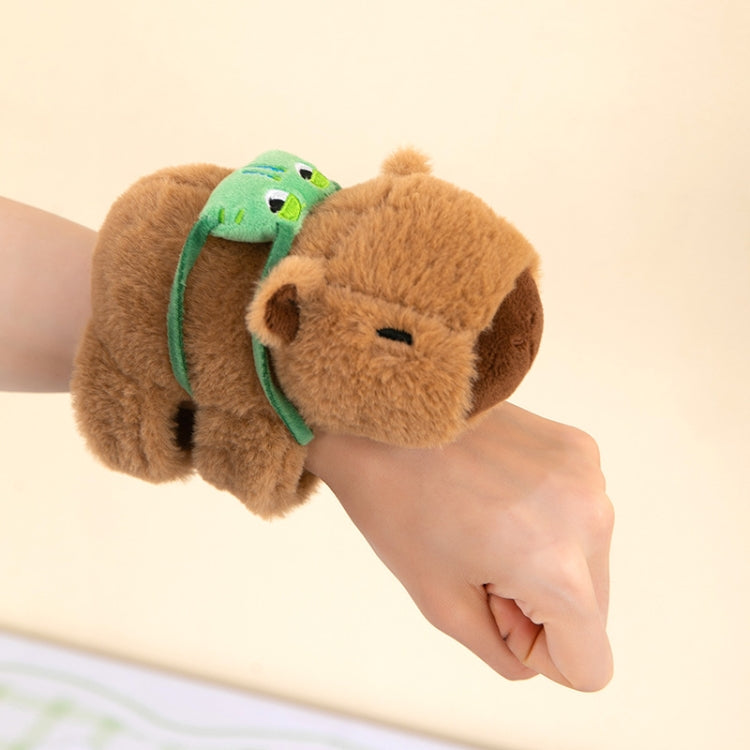 Brown plush turtle snap-ring bracelet with green frog-style backpack and pull ring