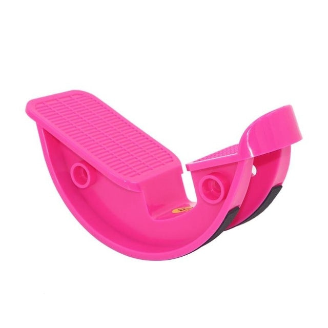 Pink ankle stretch massage pedal with ridged textured foot plate and curved base