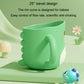 Green dinosaur baby cup with sculpted sides and rounded rim
