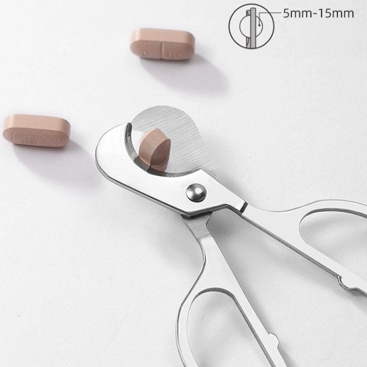 Stainless steel pill cutter with 5–15mm cutting range shown and silicone case