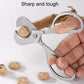 Stainless steel pill cutter scissors held in hand with rounded cutting head
