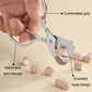 Stainless steel pill cutter with rounded head design and warm, skin-friendly silicone grip