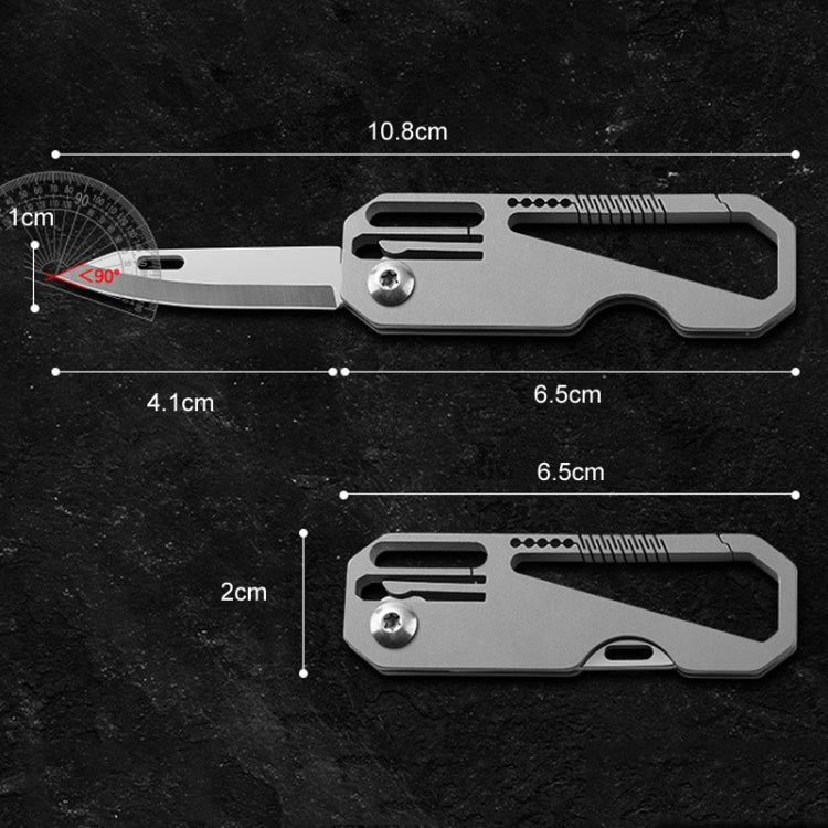 Mini folding knife showing open and closed views, titanium-look body