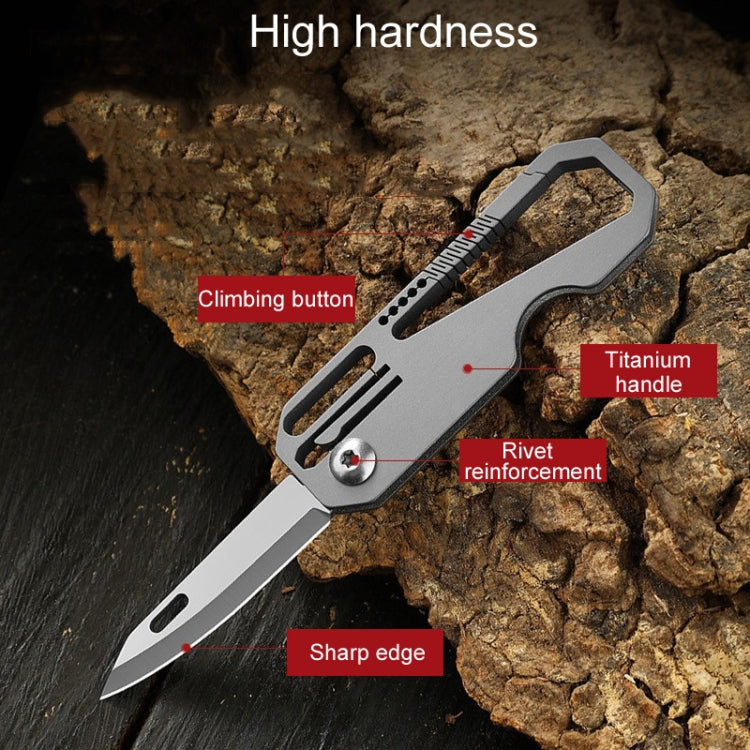 Mini titanium folding knife with sharp edge, reinforced rivet, and finger grip