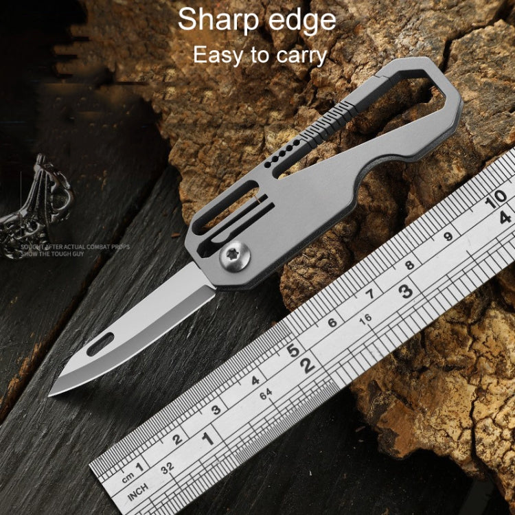Folding mini titanium keychain knife with sharp edge and handle cutout slots